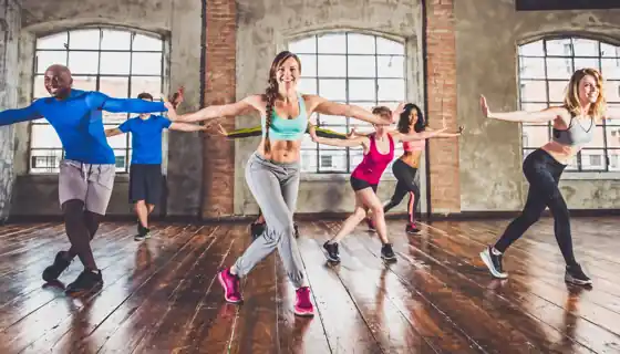 Dancers performing various styles, representing diverse activities covered by insurance.